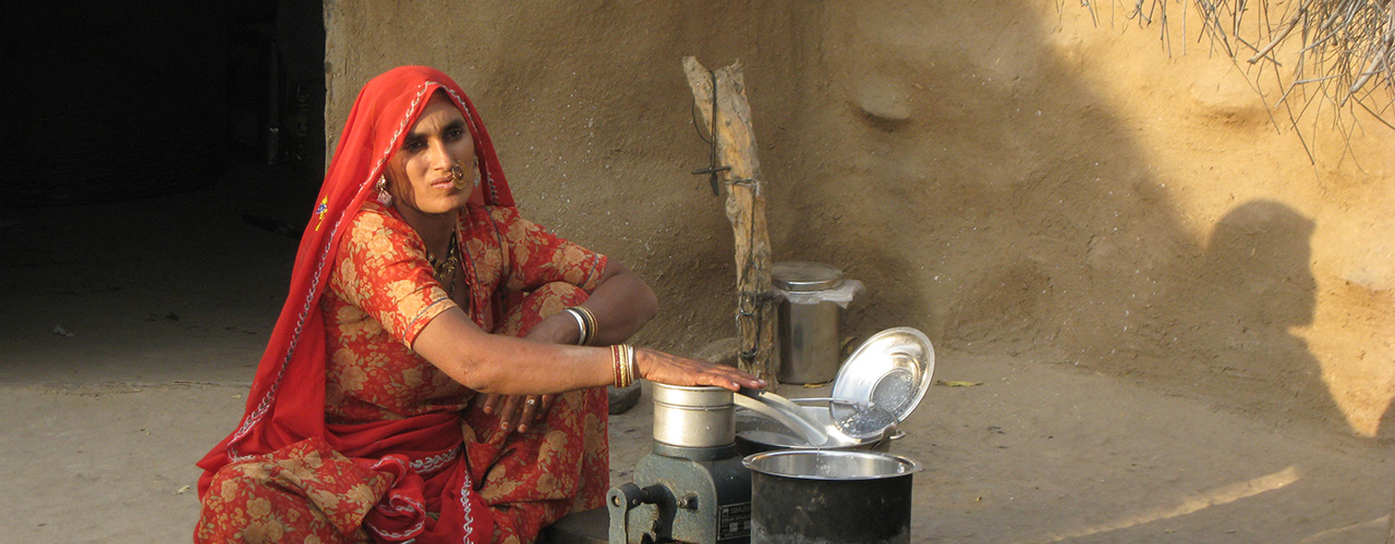 Local Woman In Her Dhani House Churning Milk - Ibex Expeditions